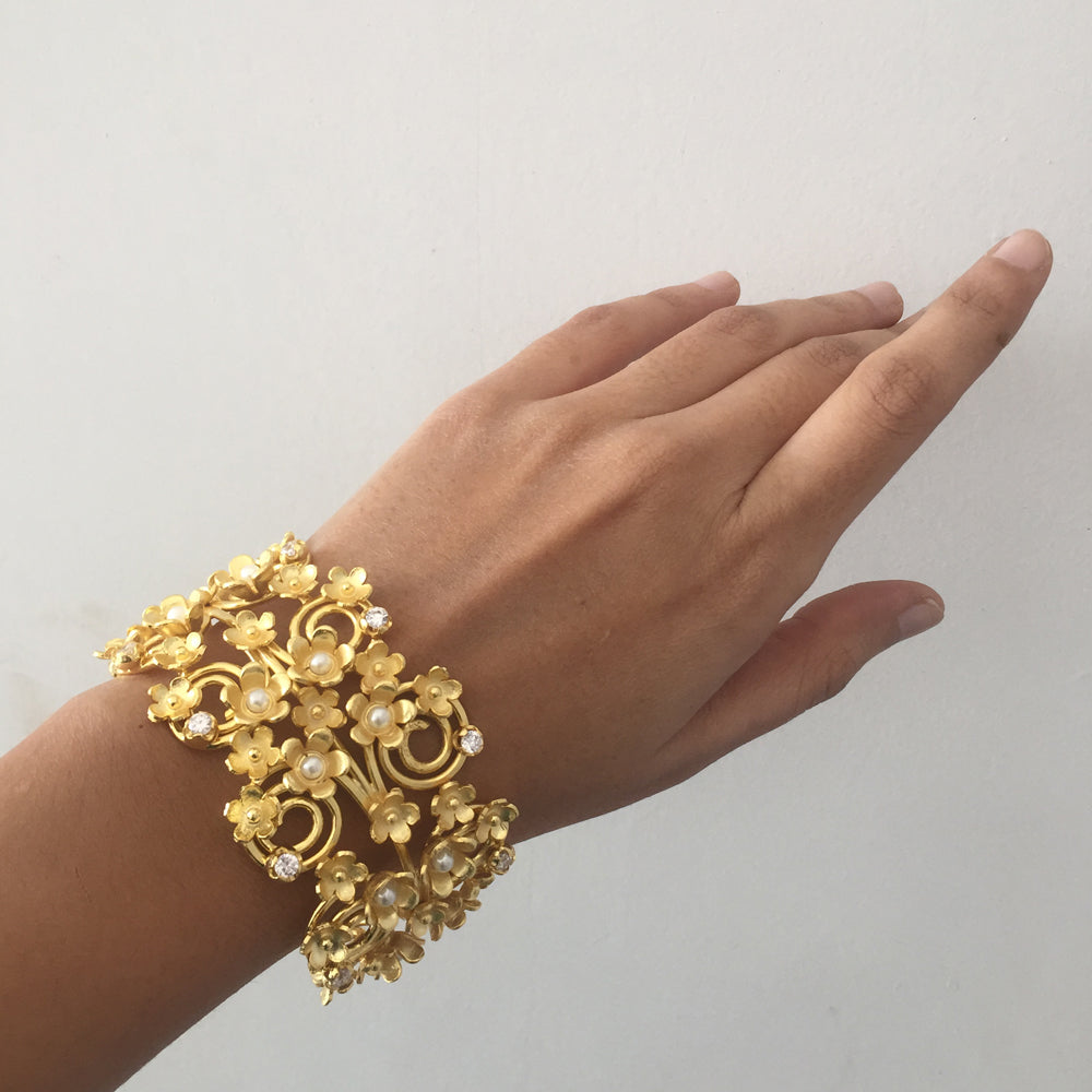 Statement Floral Bracelet With A Twist